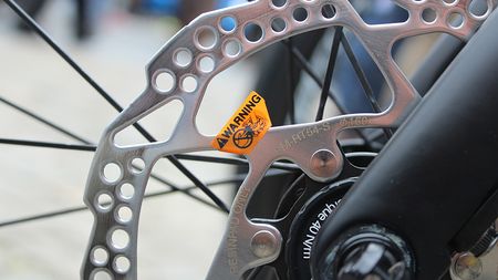 How new are disc brakes to the pro peloton? So new that mechnics haven't yet pulled off the safety stickers