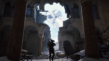 Arc Raiders Frozen Trail update trailer image raider in ruined building with leg of destroyed emperor robot visible outside