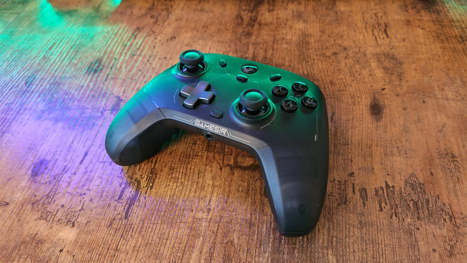 The GameSir Cyclone 2 lying on a wooden desk