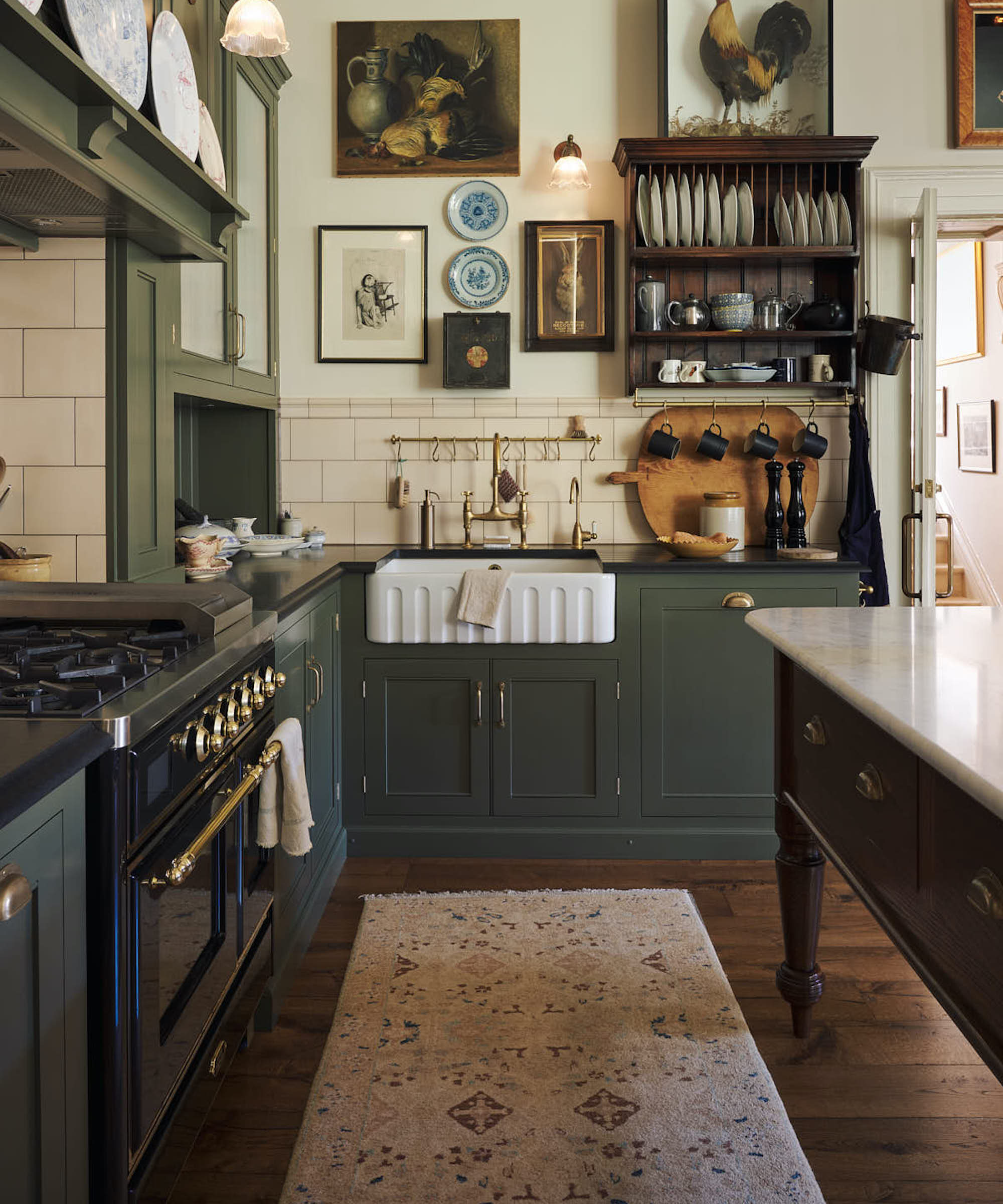 classic shaker kitchen in green with white fluted sink