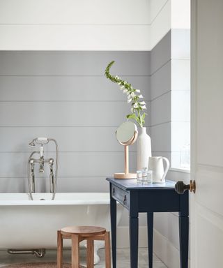 grey bathroom with horizontal panelling