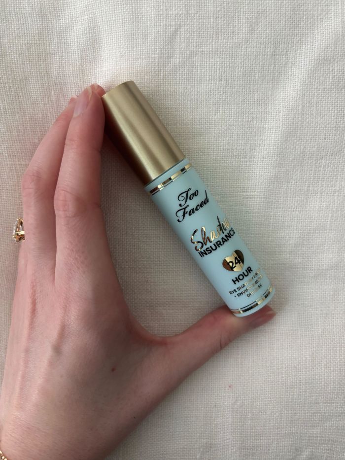 Deputy beauty editor Grace Lindsay holding the Too Faced Shadow Insurance