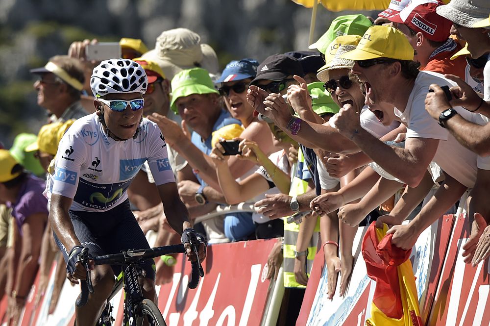 Quintana fights to maintain his position on the climb