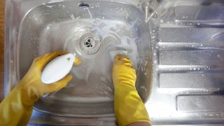 cleaning a stainless steel sink