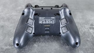 The backside of the PowerA OPS v3 Pro showing its remappable back buttons and trigger stops