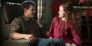 Jacob Black and young Renesmee in Twilight Saga: Breaking Dawn