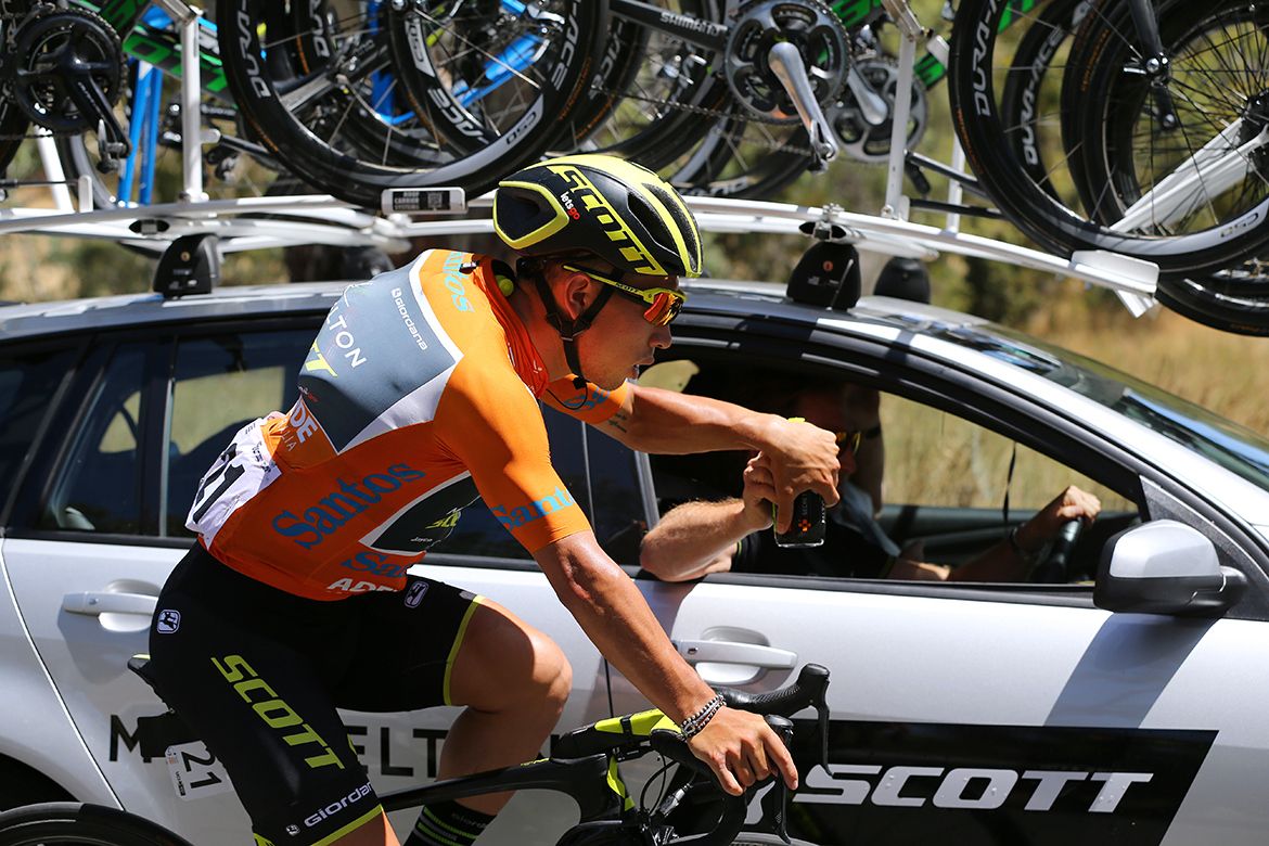 Race leader Caleb Ewan in the leader's jersey doing the work of a domestique