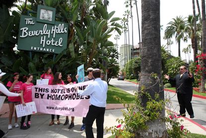Protesters call for a boycott of the Beverly Hills Hotel over human rights issues