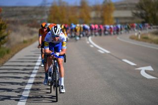Ian Garrison controls the peloton for Deceuninck-QuickStep at the 2020 Vuelta a España
