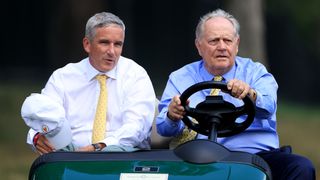 Jay Monahan is driven in a golf cart by Jack Nicklaus at the 2020 Memorial Tournament