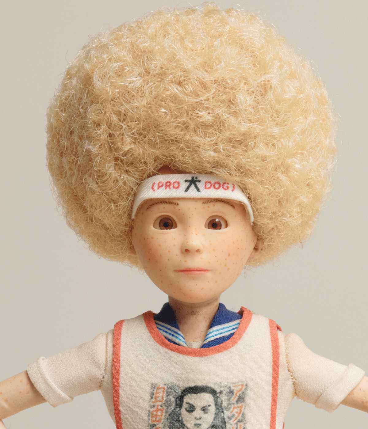 Doll wearing headband, from Wes Anderson's Isle of Dogs film