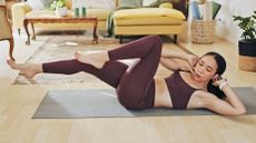 a photo of a woman doing Pilates