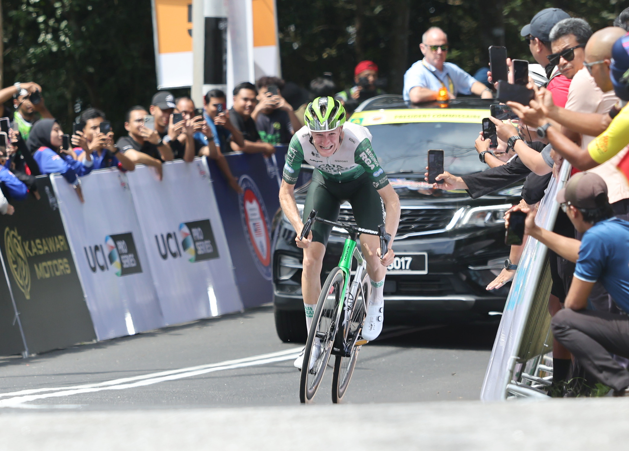 Abel Balderstone (Caja Rural-Serguros RGA) grits his teeth and pushes through to the finish line on Gunung Jerai to take second place