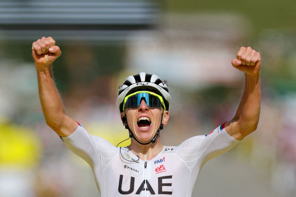 UAE Team Emirates team's Slovenian rider Tadej PogacarXXXXXXX cycles to the finish line to win the 4th stage of the 111th edition of the Tour de France cycling race, 140 km between Pinerolo in Italy, and Valloire in France, on July 2, 2024. (Photo by Thomas SAMSON / AFP)