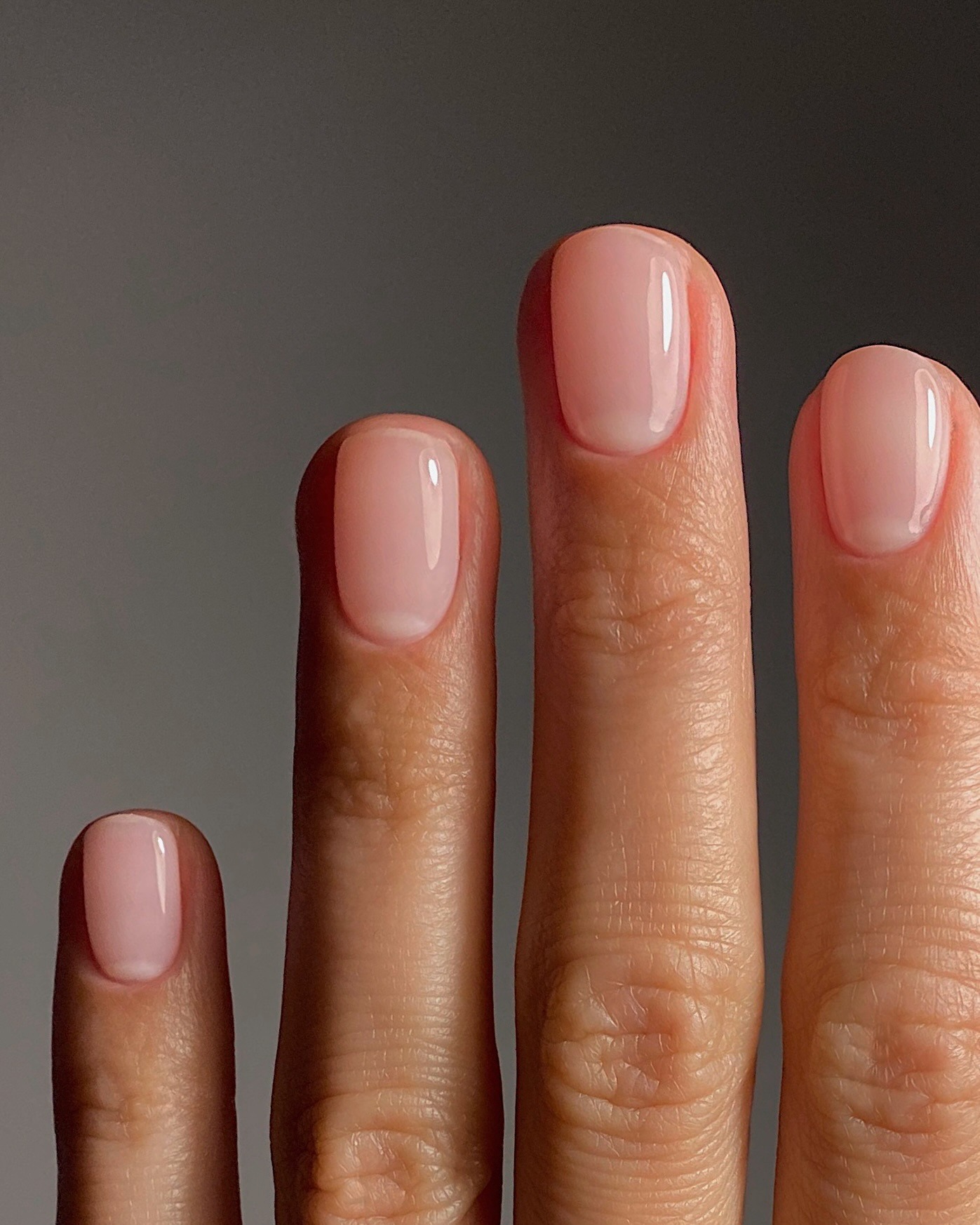 A manicure by @matejanova with a sheer pink polish colour