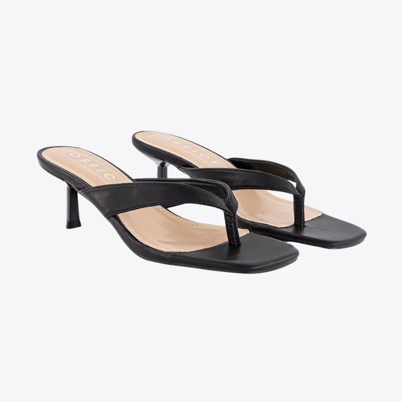 A cut out of black high heeled thong sandals