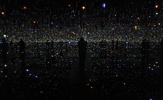 Black infinity rooms with speckled light