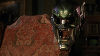 Green Goblin mask on chair in Spider-Man