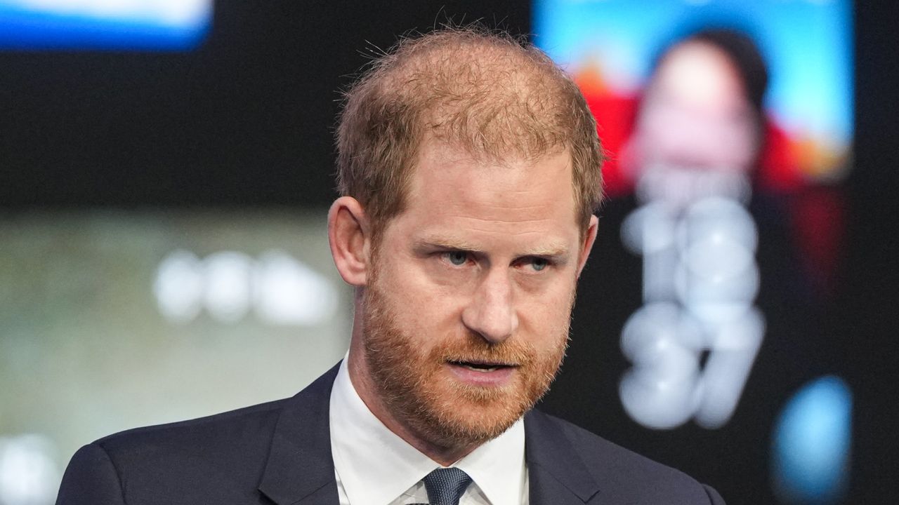 Prince Harry wearing a blue suit 