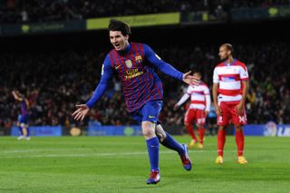 Lionel Messi celebrates after scoring for Barcelona against Granada at Camp Nou in March 2012.