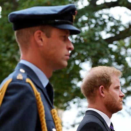 Prince William and Prince Harry standing next to each other at Queen Elizabeth's funeral