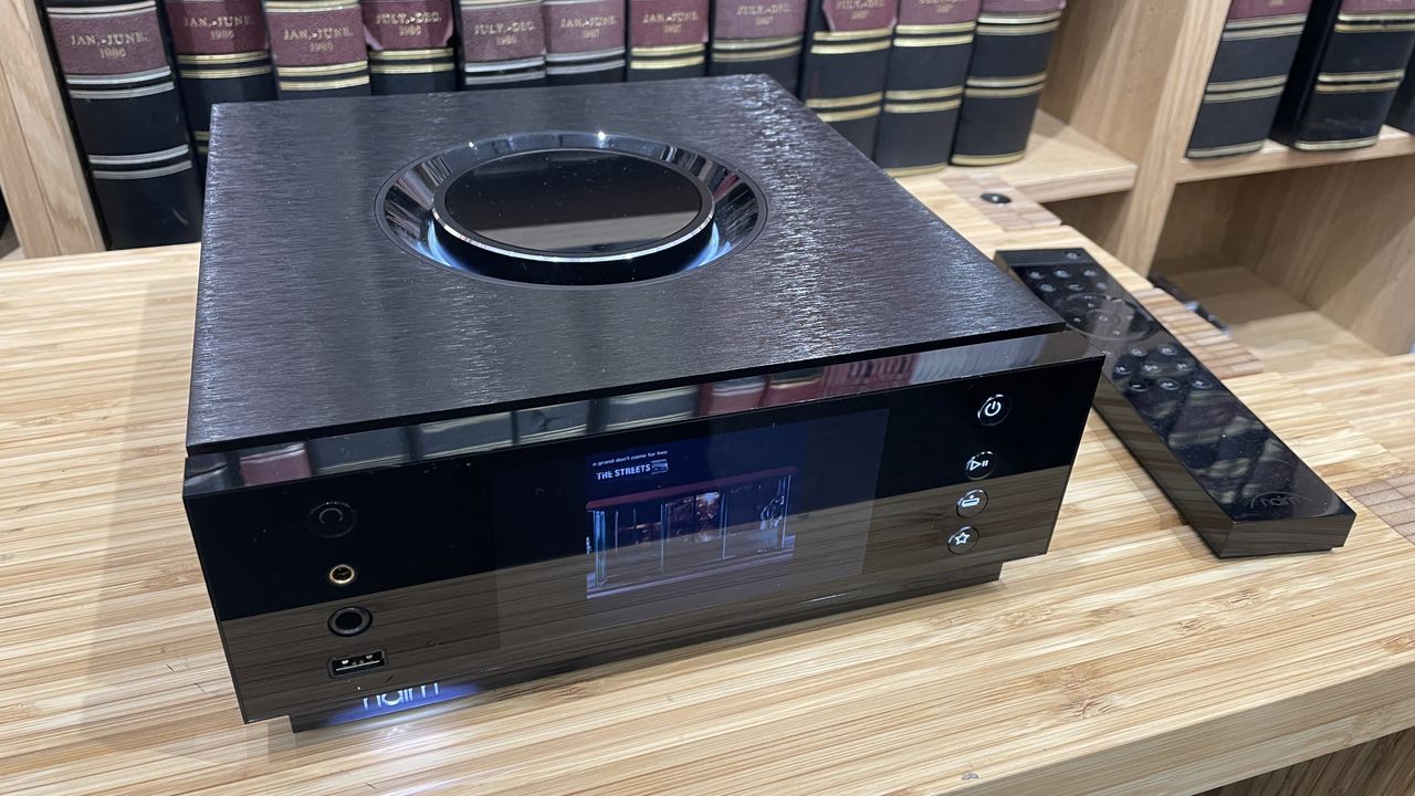 Naim Uniti Atom Headphone Edition on wooden rack