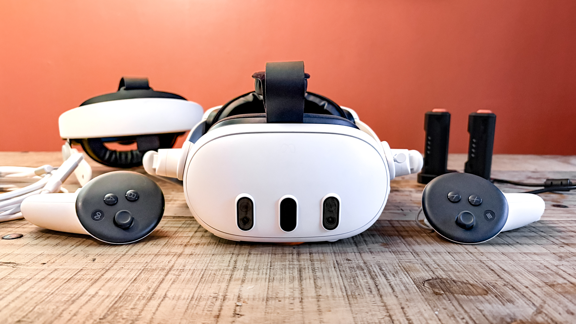 Meta Quest 3 with VR accessories on table