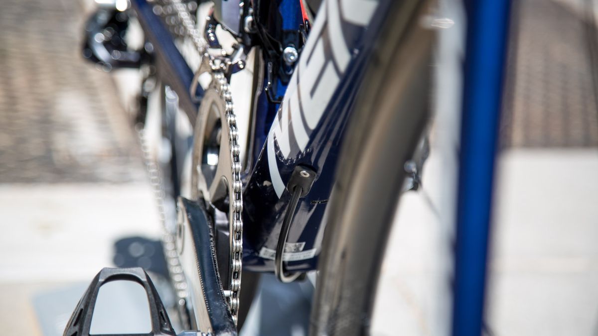 The rear brake internal cable exits underneath the downtube