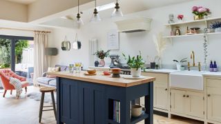 kitchen extension with blue freestanding island