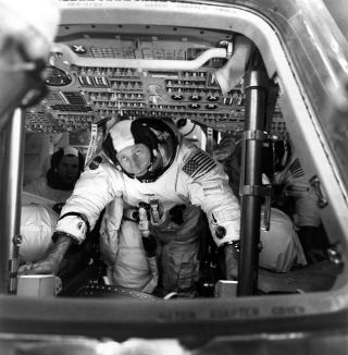 Astronaut Al Worden trains inside a command module simulator for NASA's 1971 Apollo 15 moon landing mission.