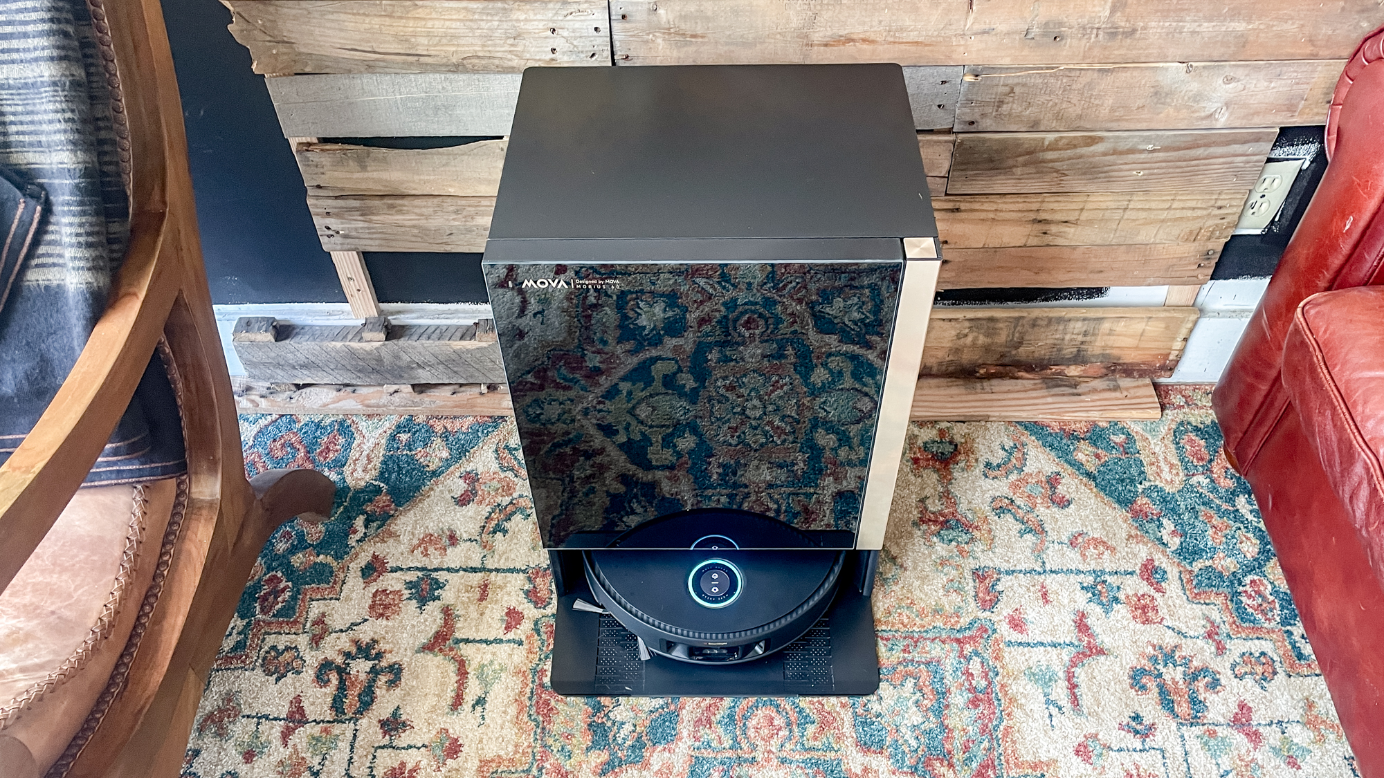 Mova Mobius 60 robot vacuum docked in the base station