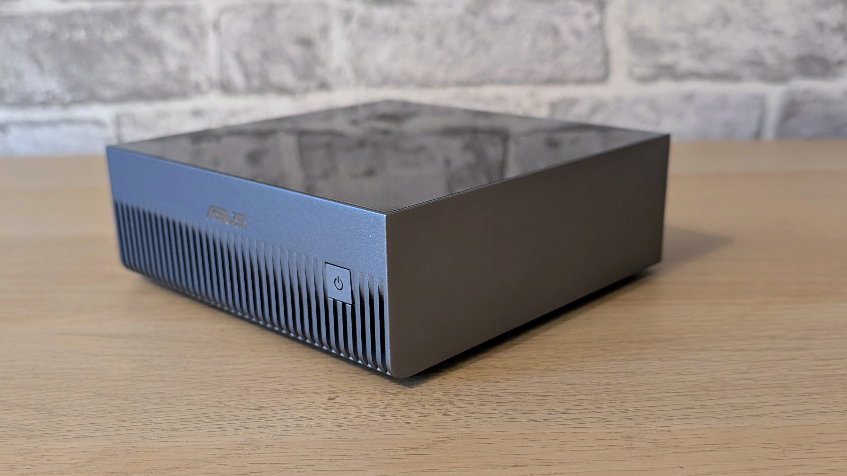 The Asus Ascent GX10 on a desk