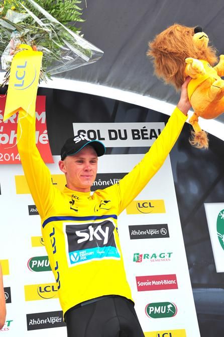 Chris Froome (Team Sky) celebrates his overall race lead after stage two at the Criterium du Dauphine