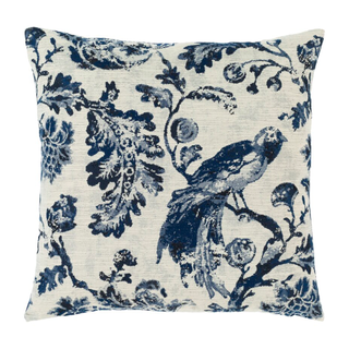 A white and blue toile pattern throw pillow