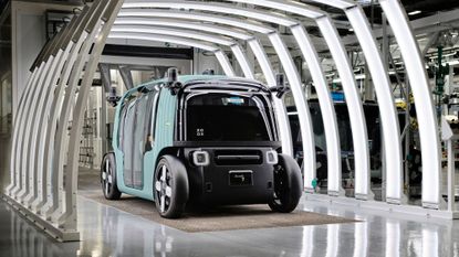 A robotaxi is seen on the factory floor of the Zoox plant in Hayward, California.