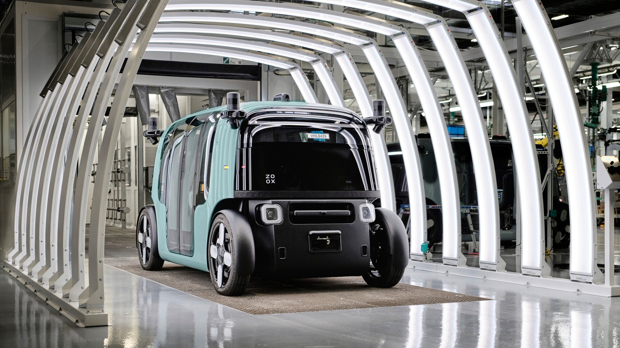 A robotaxi is seen on the factory floor of the Zoox plant in Hayward, California.