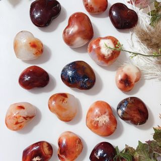 Orange carnelian crystal stones with moss