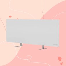 White AENO Premium Eco Smart Panel Heater on a pink background