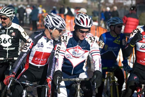 Dirk Cowley (Ffkr Architects/Sportsbaseonline) discusses his front line strategy with Randall Root (Evolution Cycling) in the 55-59 race.