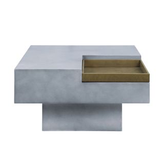 A gray square concrete coffee table