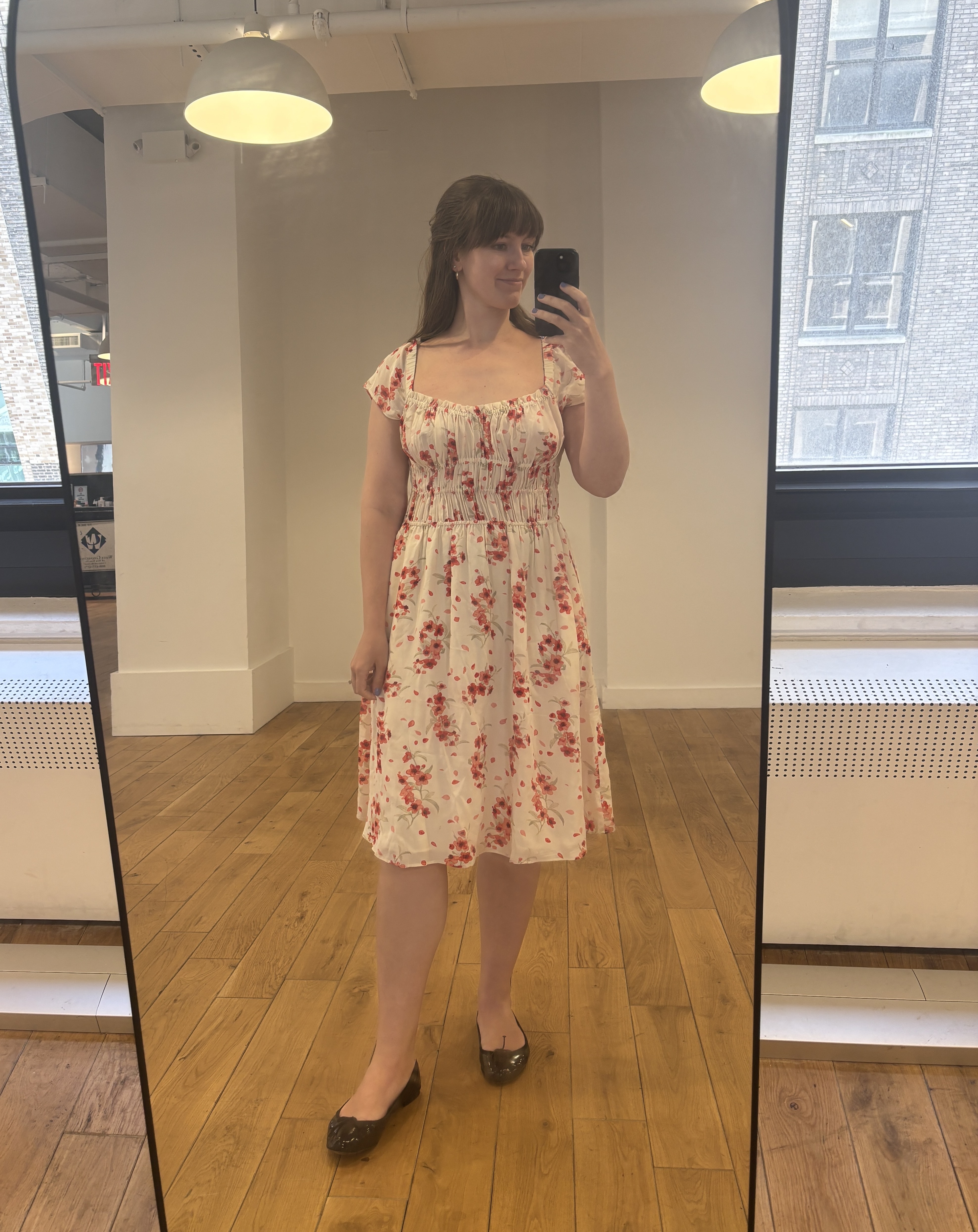 Halie LeSavage wears a floral dress from the jcrew collaboration