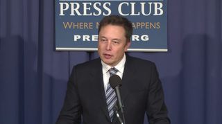 SpaceX founder and CEO Elon Musk discusses plans for reusable rocket technology during a press conference at the National Press Club in Washington, D.C. on April 25, 2014.