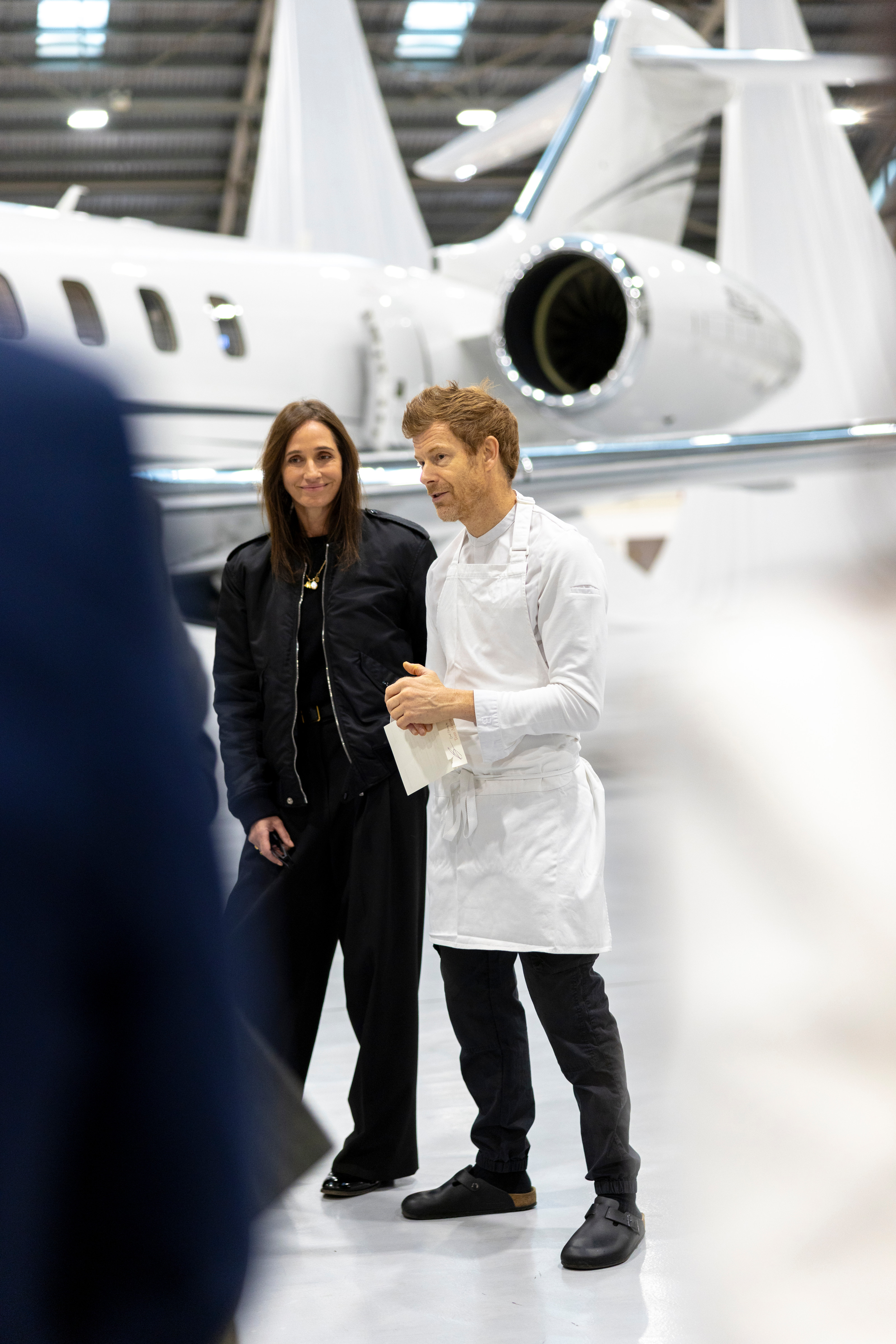Rosemary Ferguson and Tom Aikens at Farnborough Airport with the Bombardier Global 7500