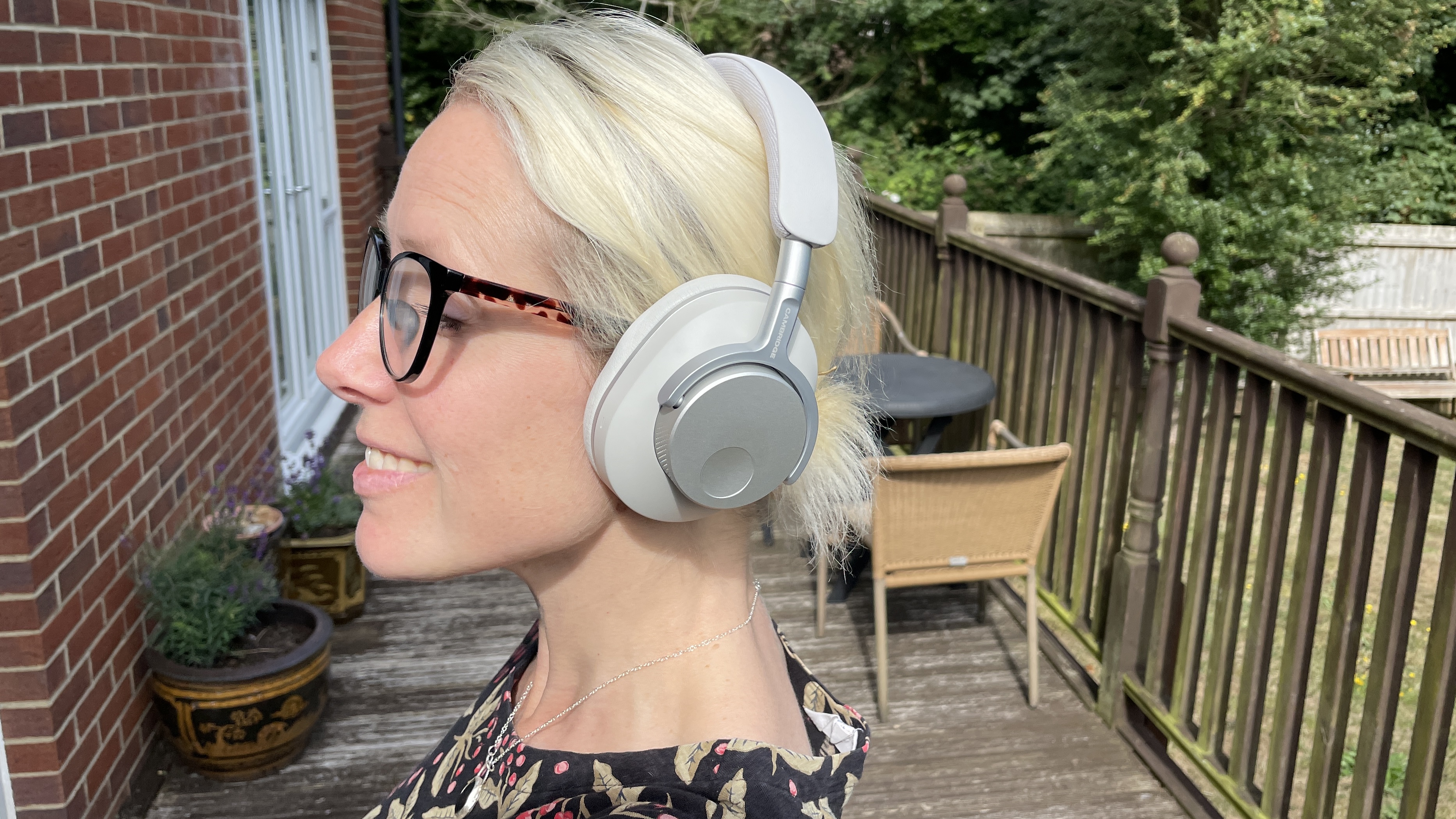 Cambridge Audio Melomania P100 with the original P100, either worn by Becky Scarrott or next to each other, to illustrate the similarities