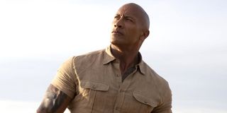 Dwayne Johnson looks into the distance Jumanji: The Next Level