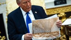 President Donald Trump shows renderings of proposed ballroom
