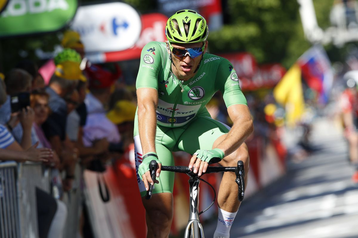 Marcel Kittel crosses the line and losses the sprinters green jersey