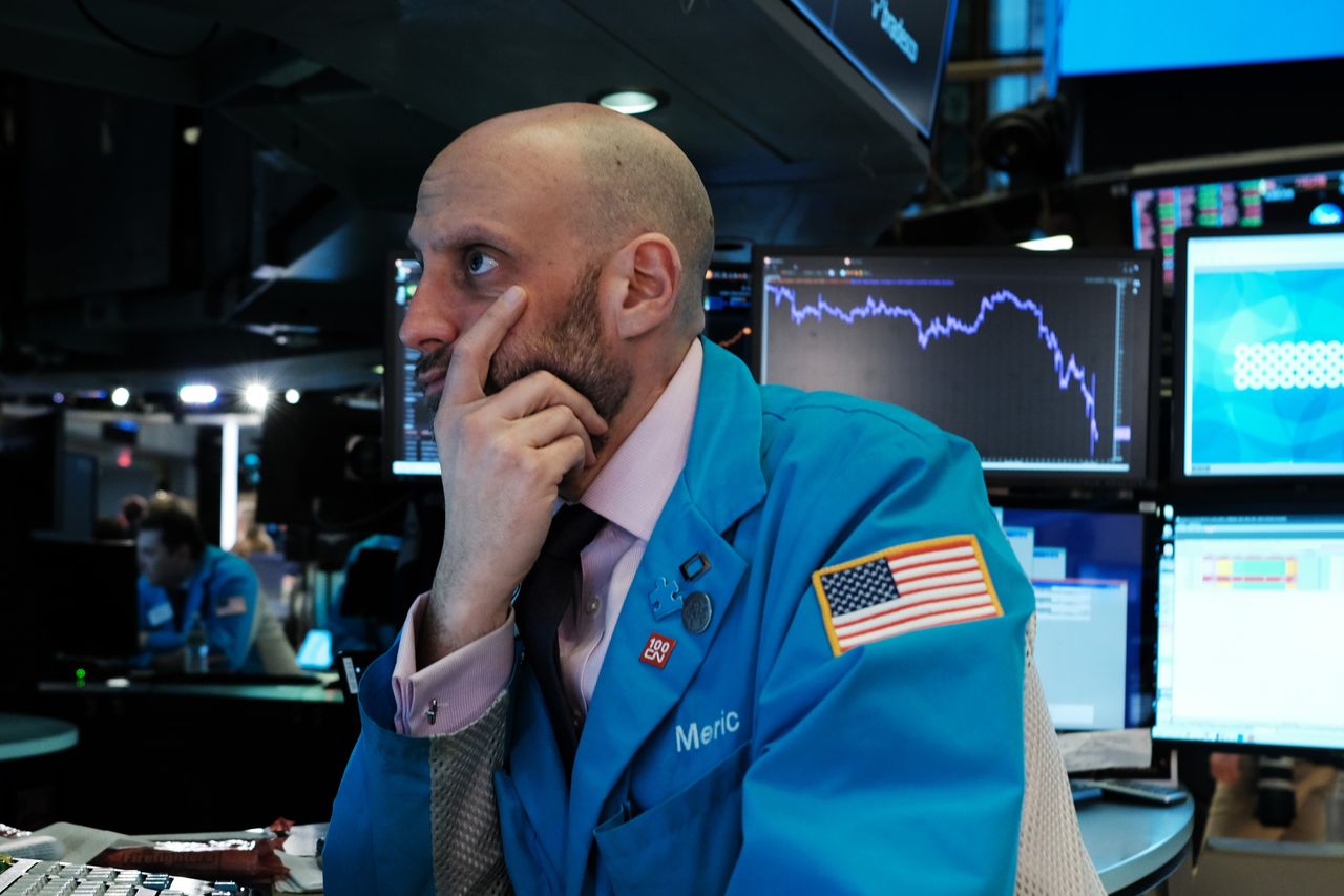 A trader on the NYSE floor