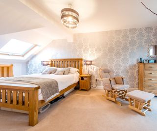 A dormer loft conversion housing a master bedroom-cum-nursery