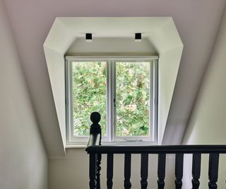 landing window with dark handrail